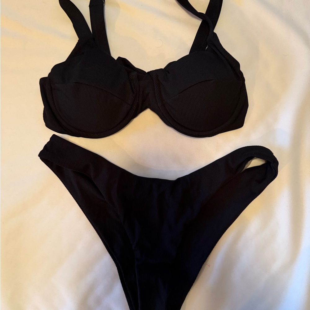 Classic Black Bikini with Adjustable Straps and High-Cut Design